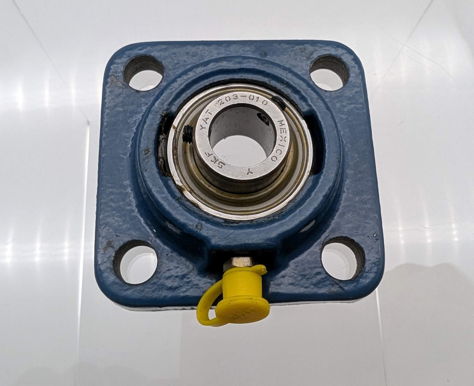 SKF FY 5/8 RM 4-Bolt Square Flanged Ball Bearing Unit 5/8″ Bore Cast Iron