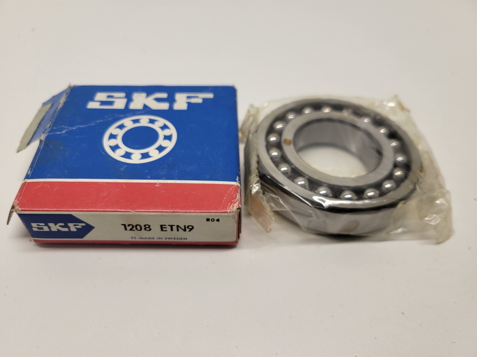 NEW IN BOX! GENUINE SKF SELF ALIGNING BALL BEARING 1208-ETN9