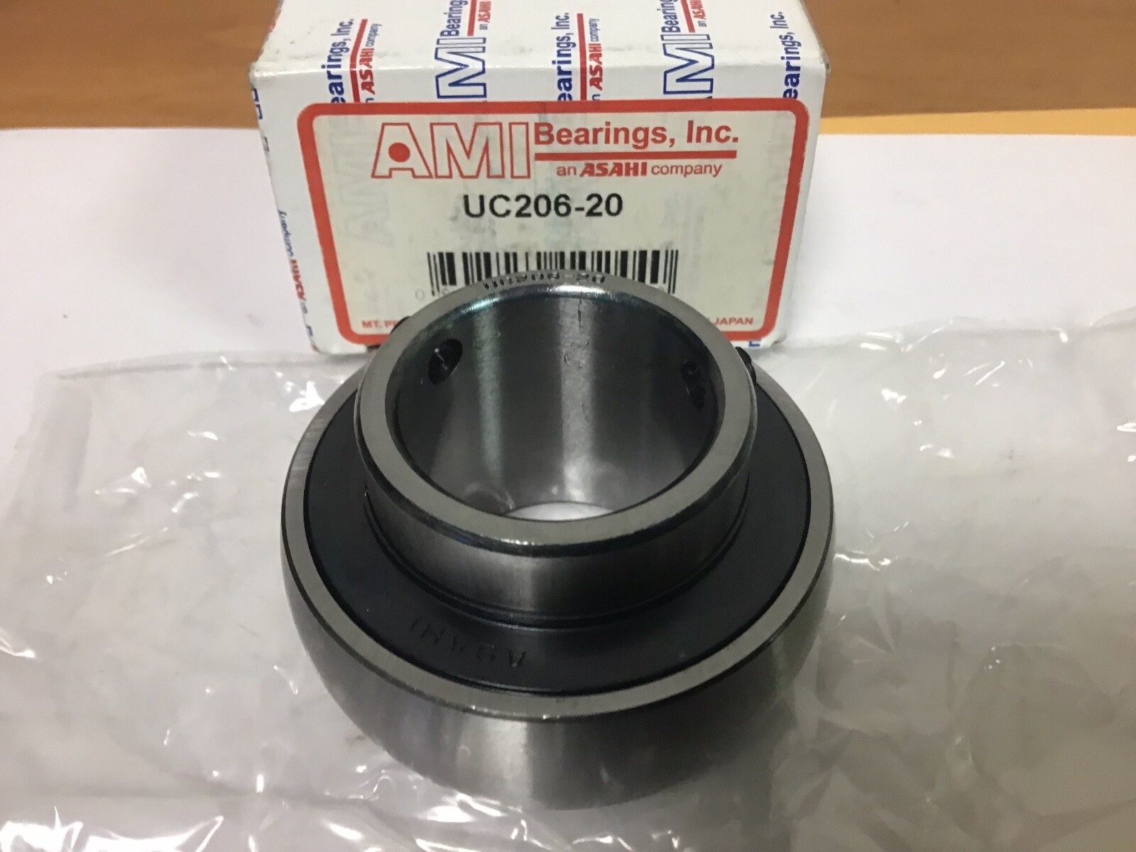 New AMI UC206-20 Insert Bearing, 1.2500″ ID, 2.4409 OD, With Set Screw
