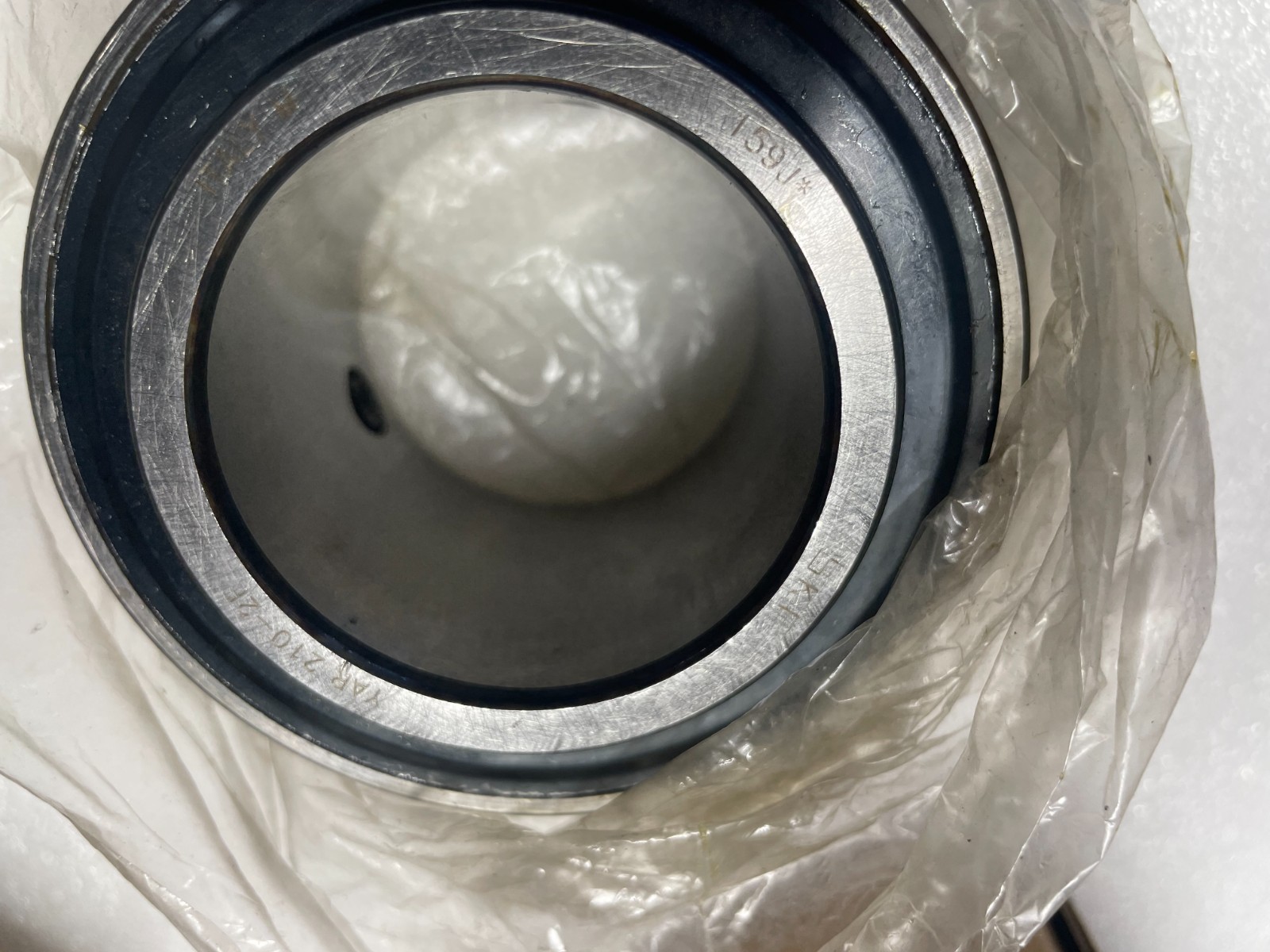 Two SKF YAR210-2F Insert bearings