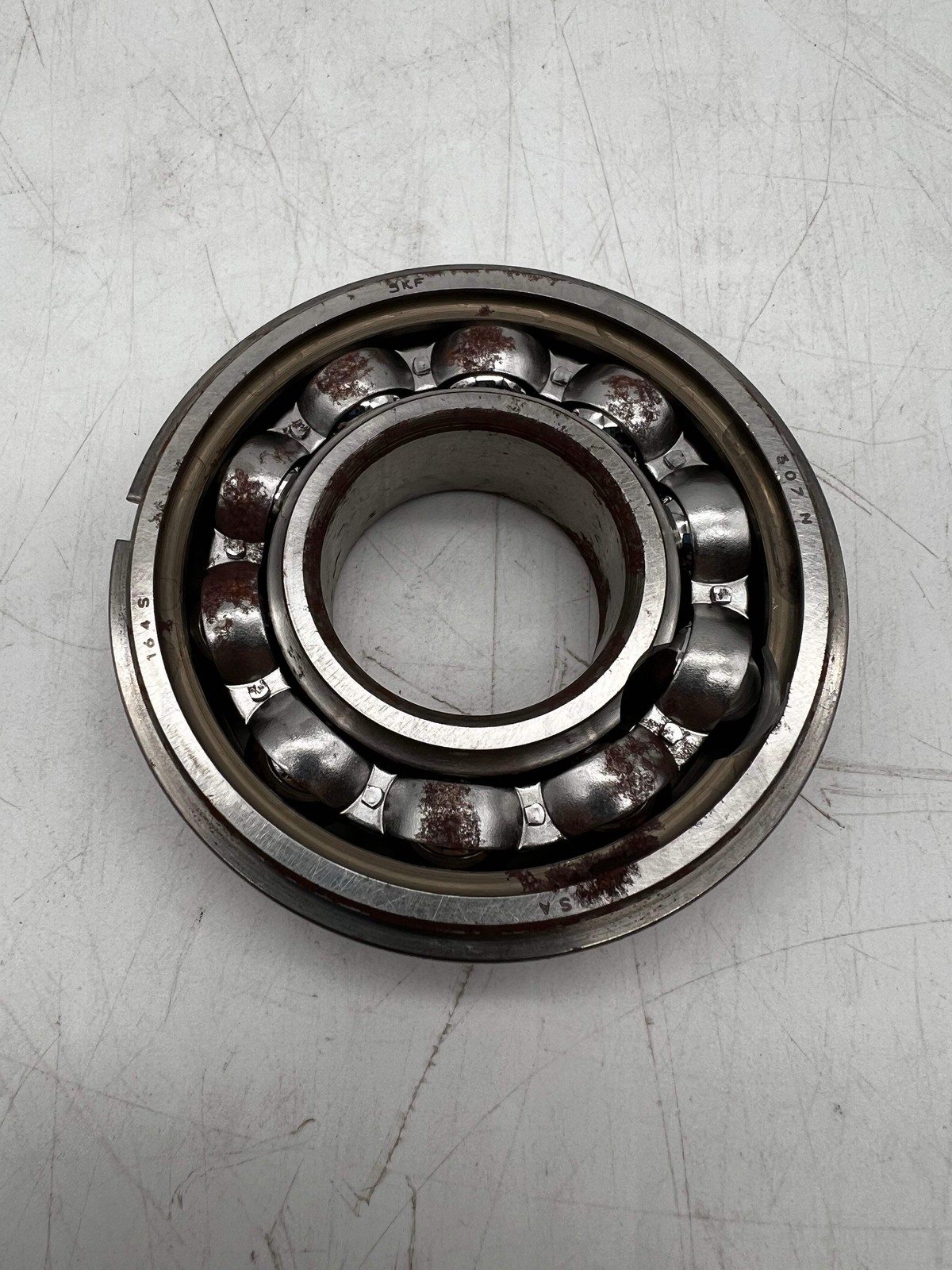 SKF 307-NR Single Row Ball Bearing, 3.15″O.D x 1.378″I.D x 0.827″W (Open Box)