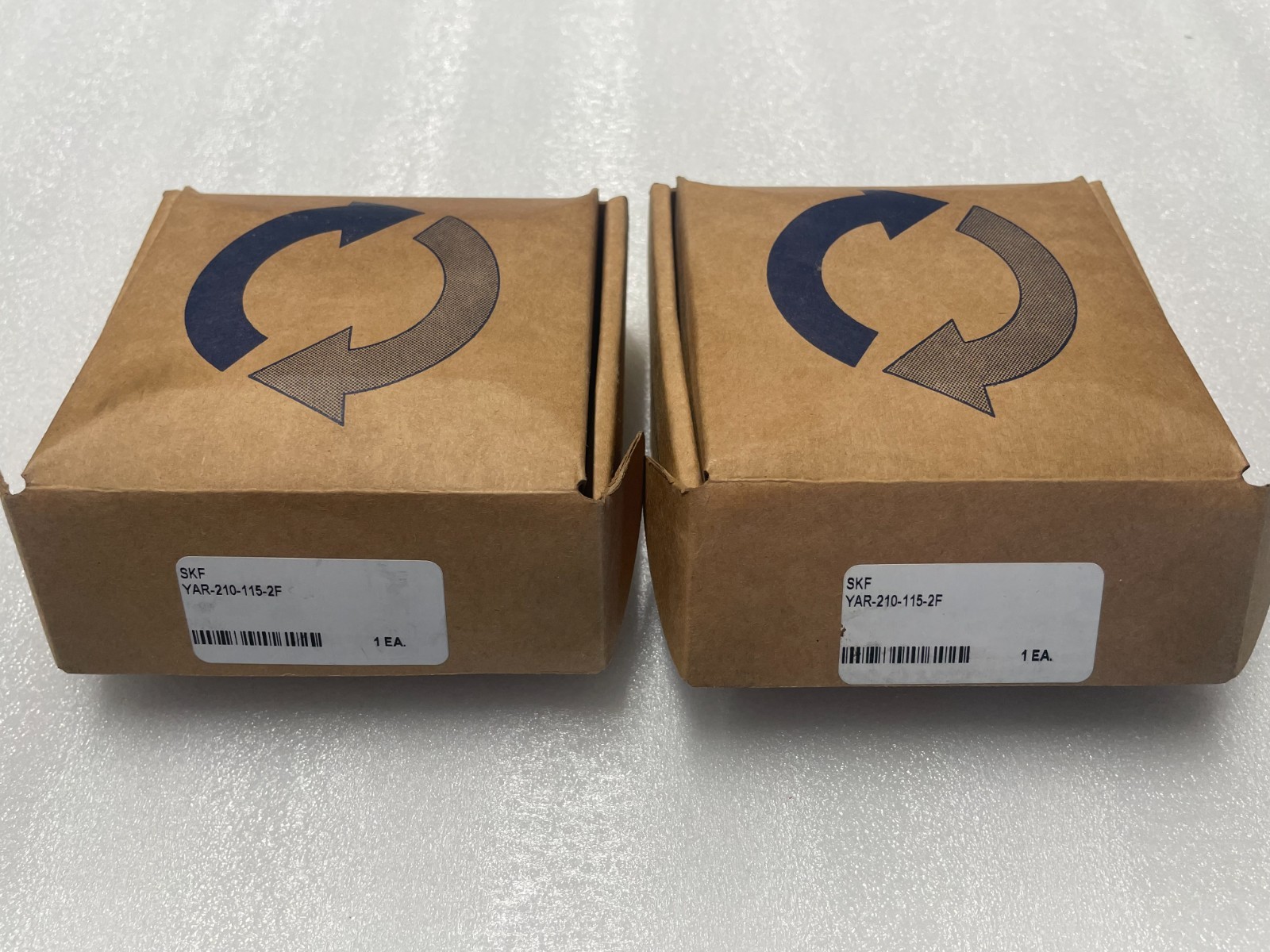 Two SKF YAR210-2F Insert bearings