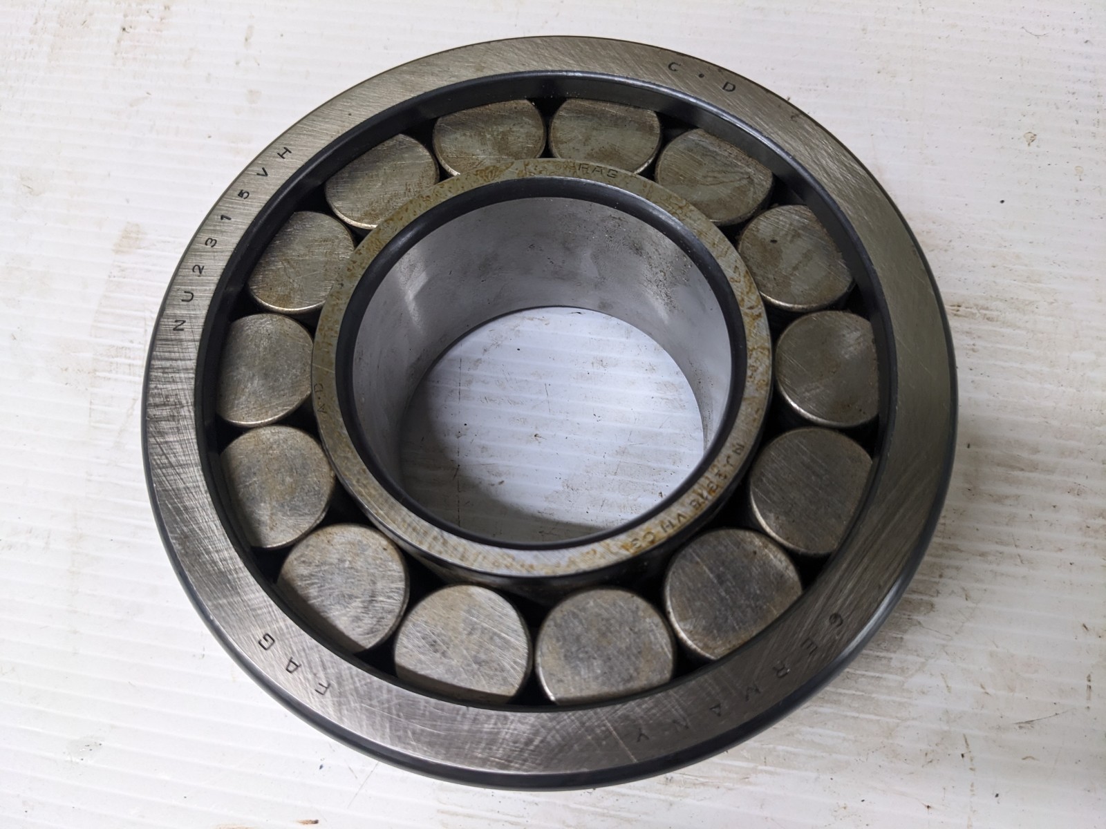 NJ2315.VH.C3 cylindrical roller bearing, made in Germany. * – full complement