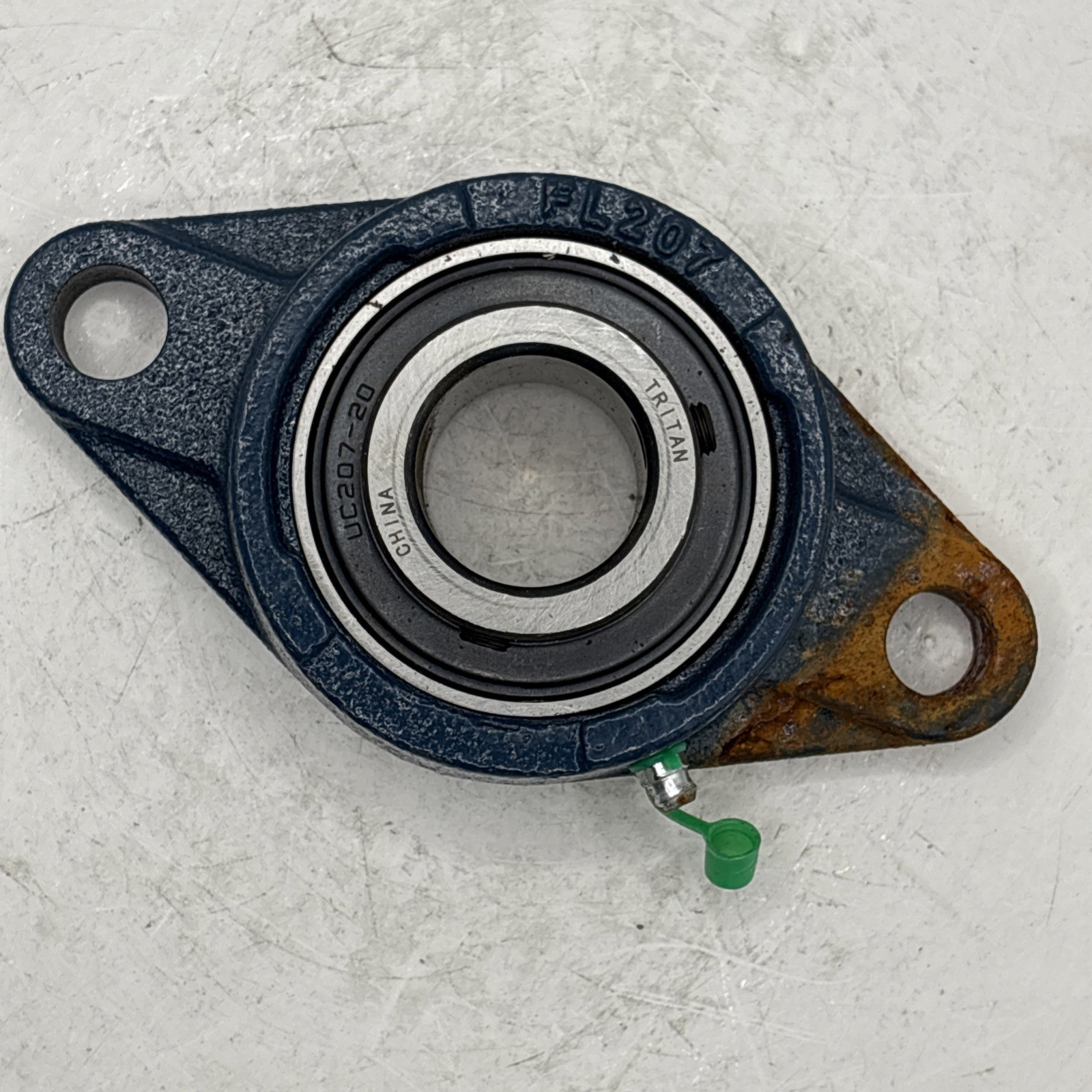 Tritan UC207-20 Bearing On FL207 Housing