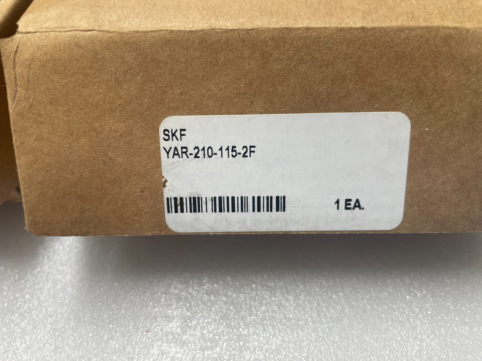 Two SKF YAR210-2F Insert bearings