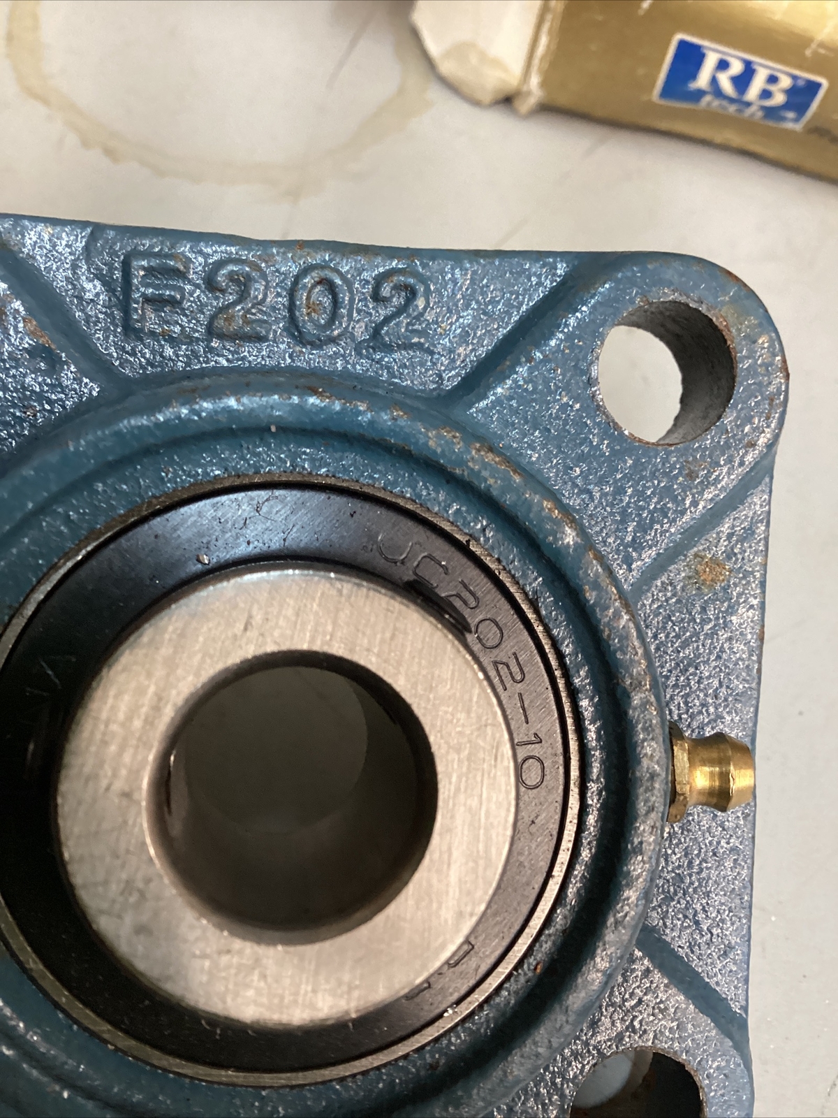 RB Tech 4 Hole Flange Bearing #UC202-10, Flange F202