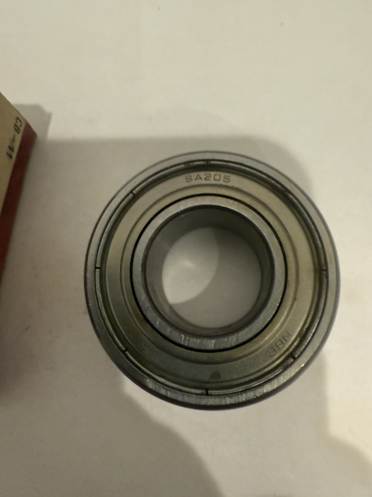New NBR SA205 W/COL Insert Bearing, 0.9843″ ID, 2.0472″ OD, 1.2205″ OD