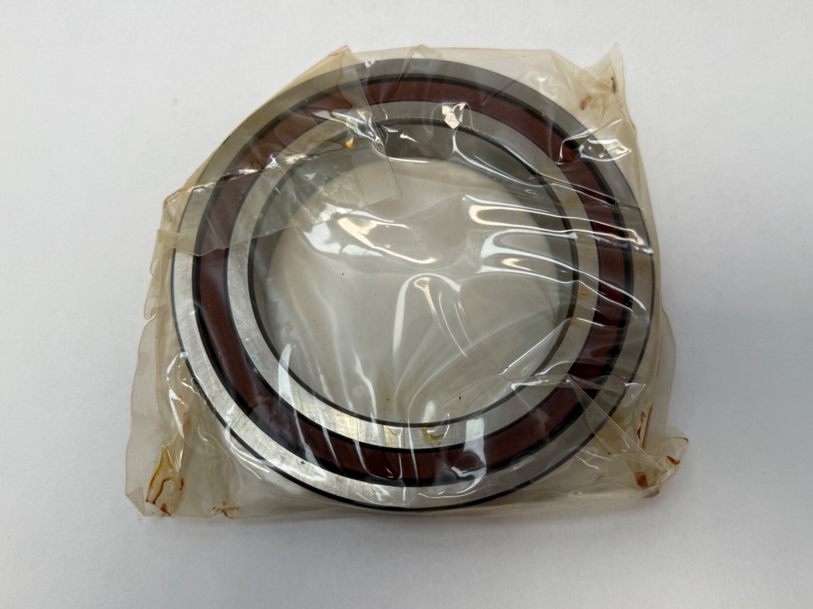NDH Q0L20DTX7A Angular Contact Bearing 7020C Q-0L20-DT-X7A 100x150x24 mm