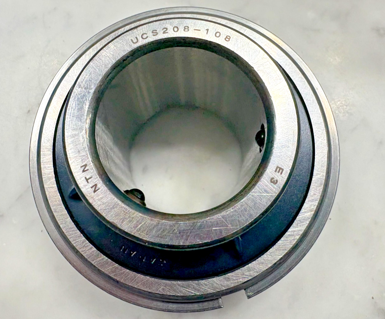 NTN Insert Bearing: UCS208-108LD1NR, 1 1/2 in Bore, 3 9/64 in OD, 0.826 W ,Japan