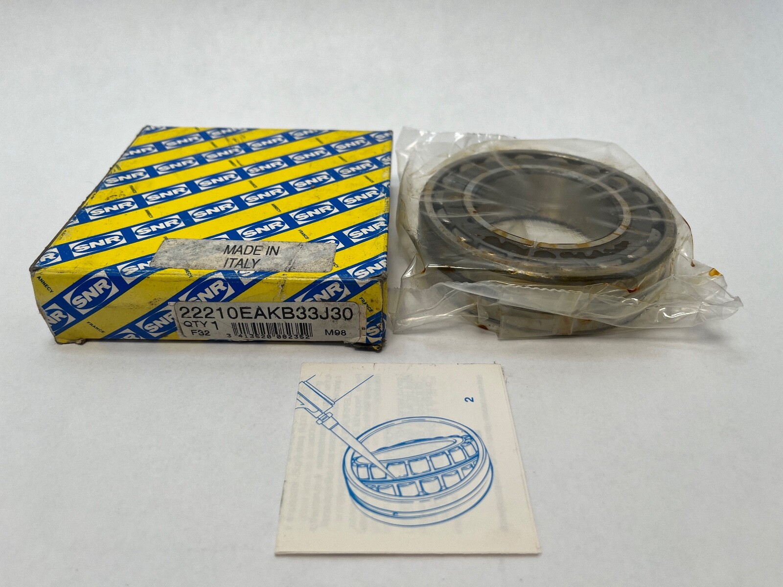SNR 22210EAKB33J30 Bearing 50x90x23 mm 22210-E-A-K-B33-J30 22210EAKW33C3 Italy