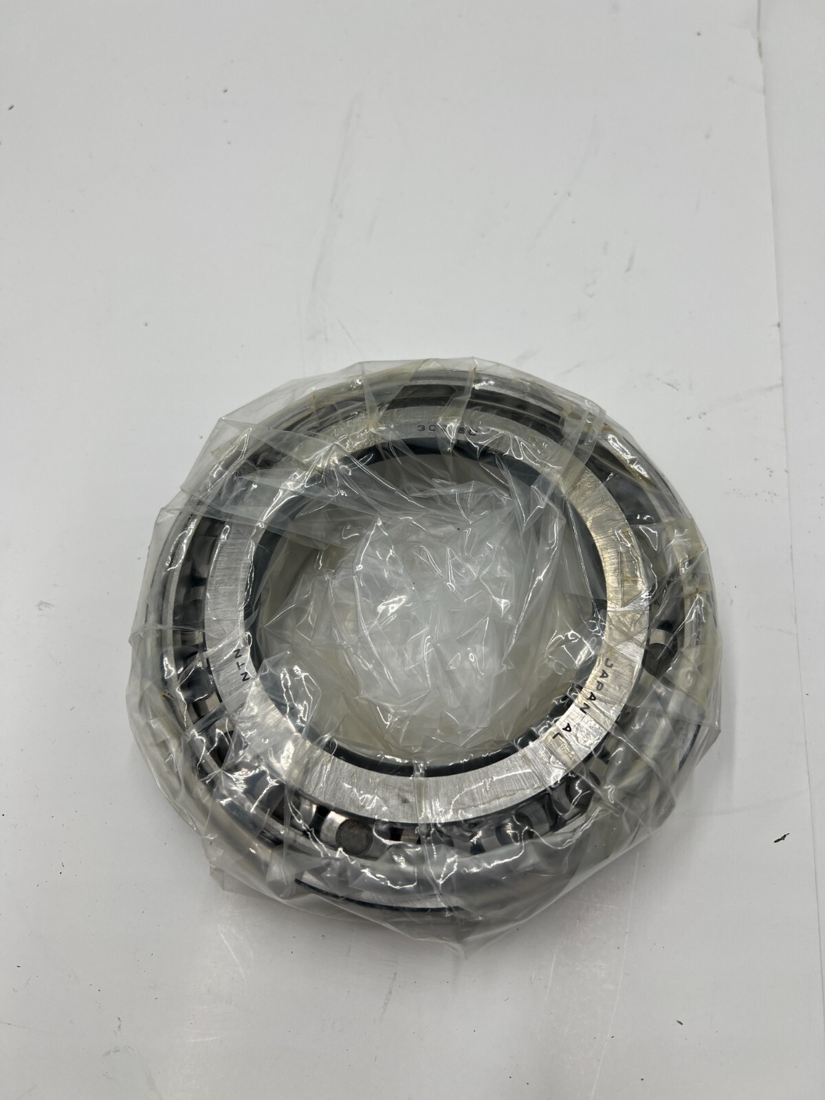 NTN Bearing Tapered Roller Bearing, Pressed Steel Cage 30216U