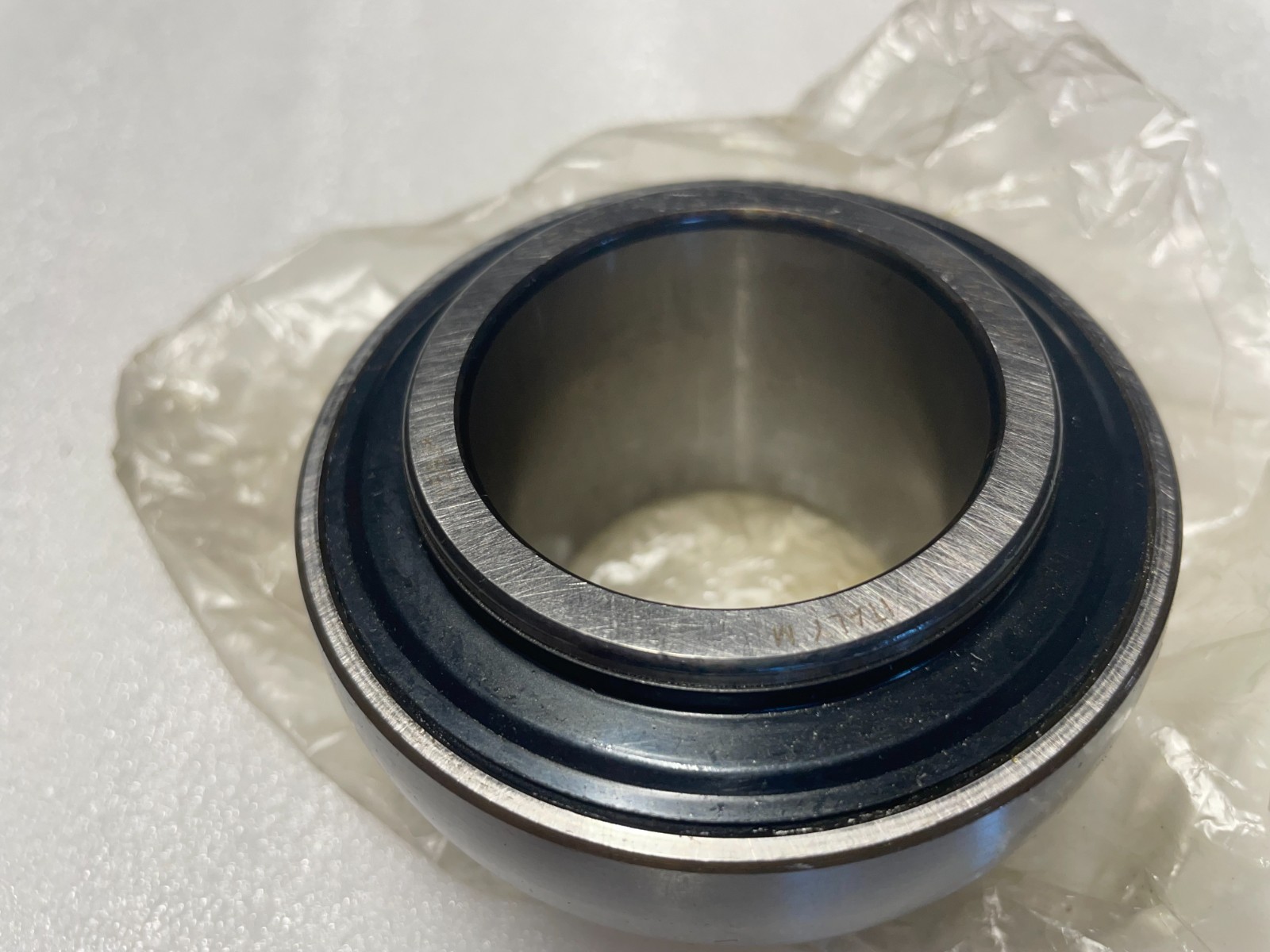 Two SKF YAR210-2F Insert bearings