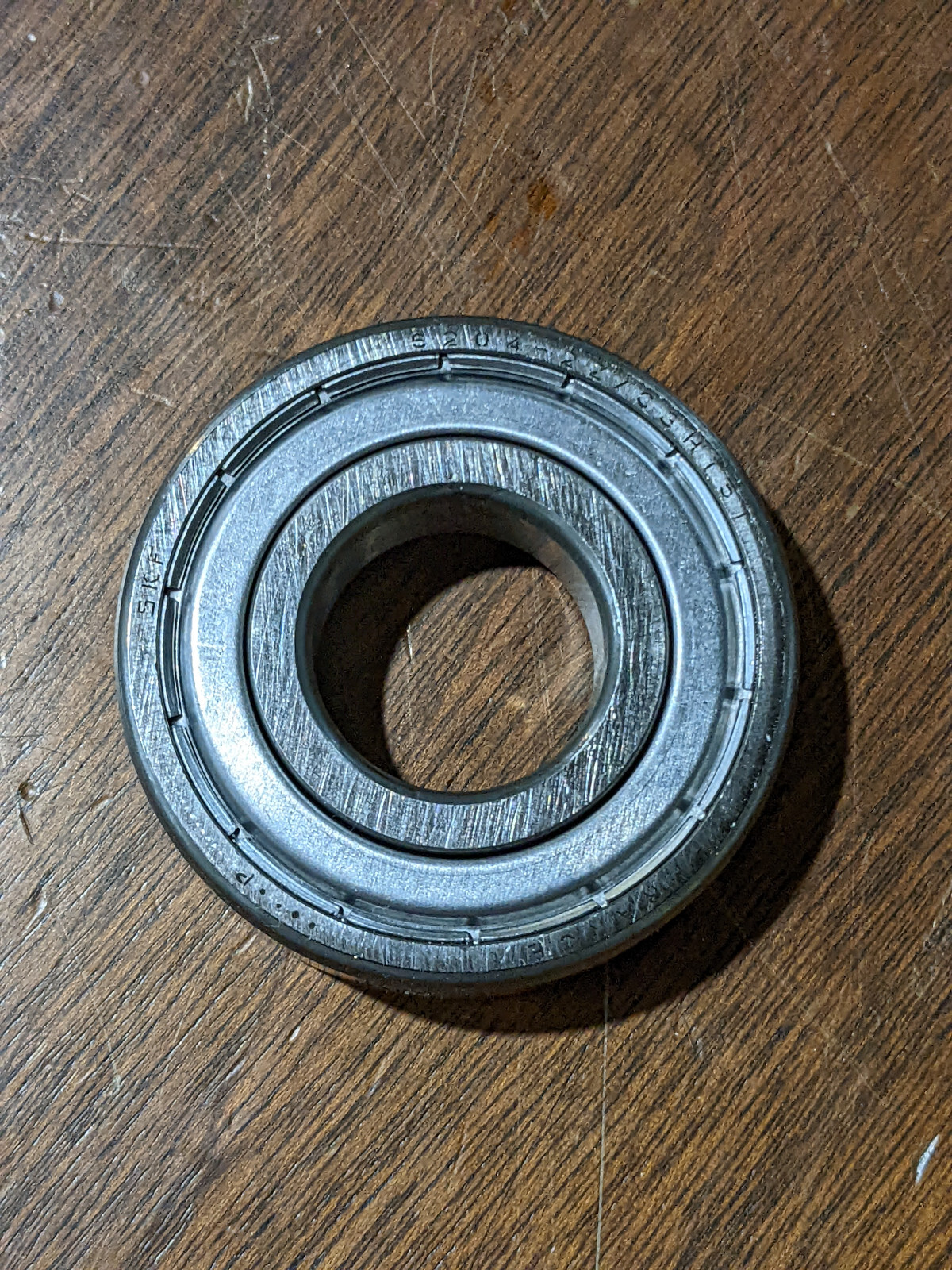 SKF Model: 6004-2ZJEM-UE01 Deep Grove Bearing. New Old Stock
