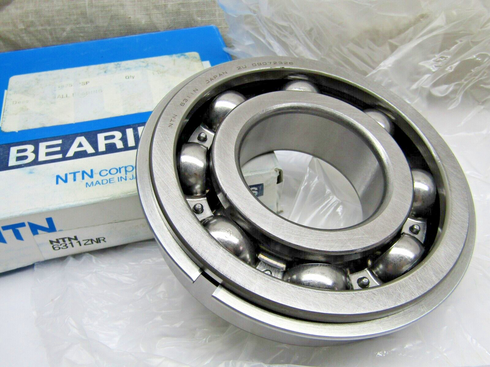 NTN 6311ZNR 55mm x 120mm x 29mm Snap Ring Bearing with 1 Metal Shield
