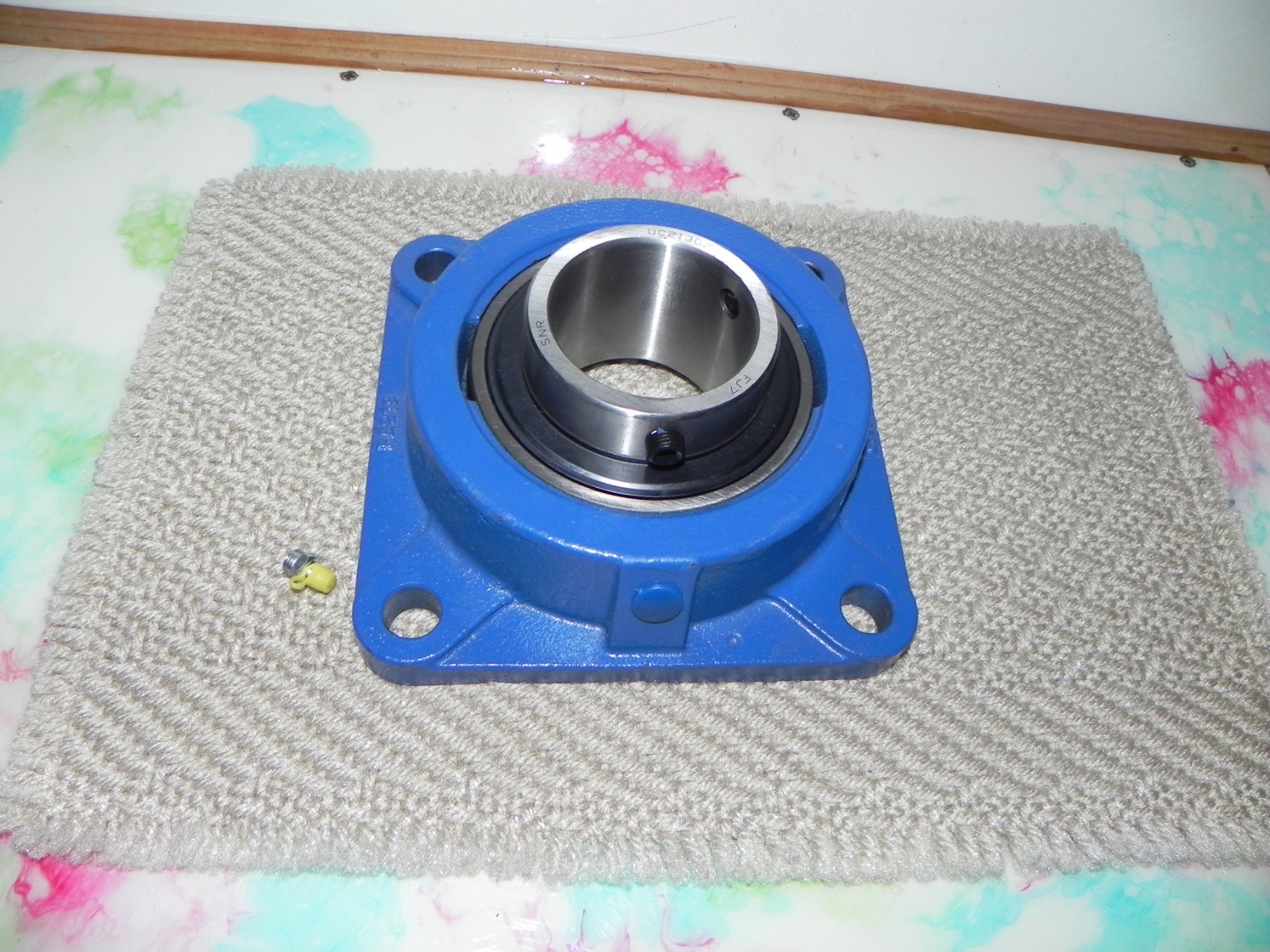 SNR FE213 4 Bolt Square Mounted Flange Bearing , 65 mm (approx. 2.56 in) UC213G2