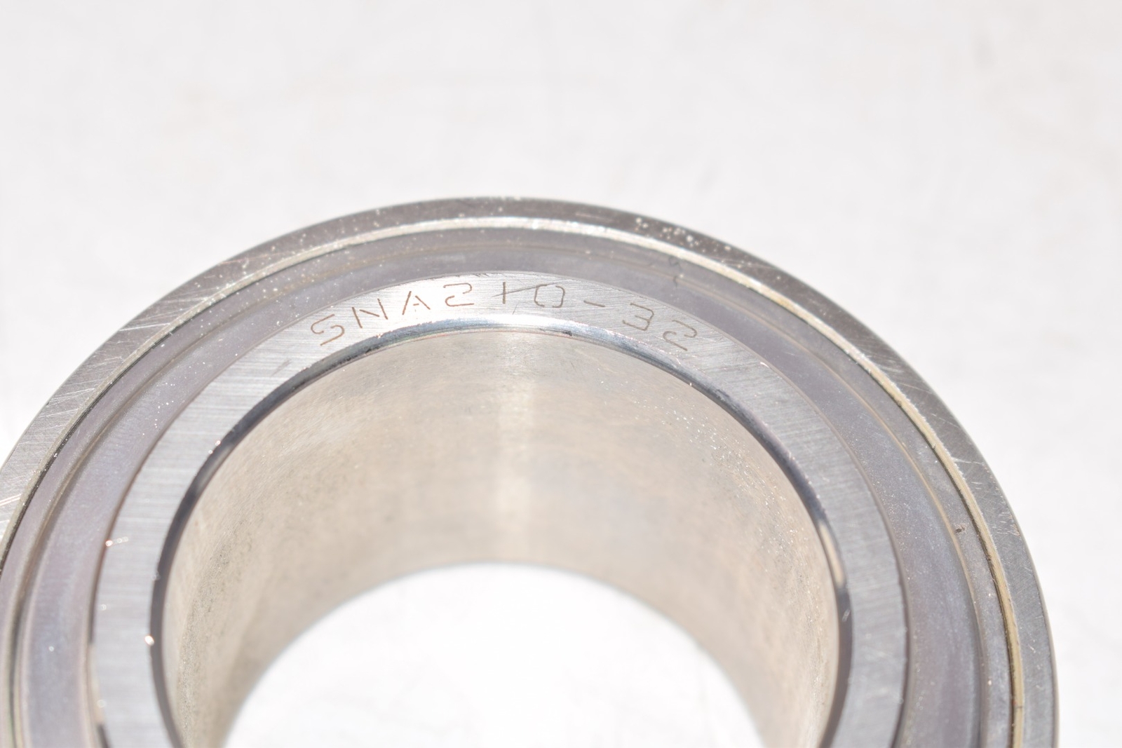 NEW IPTCI SNA21032 STAINLESS STEEL ECCENTRIC LOCKING BEARING INSERT 2”