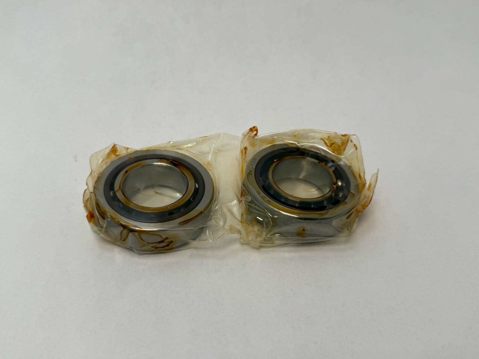 NDH Q0L05BDTS9A Angular Bearing 7005C Q-0L05-B-DTS-9A 25x47x12 mm 2 Pcs
