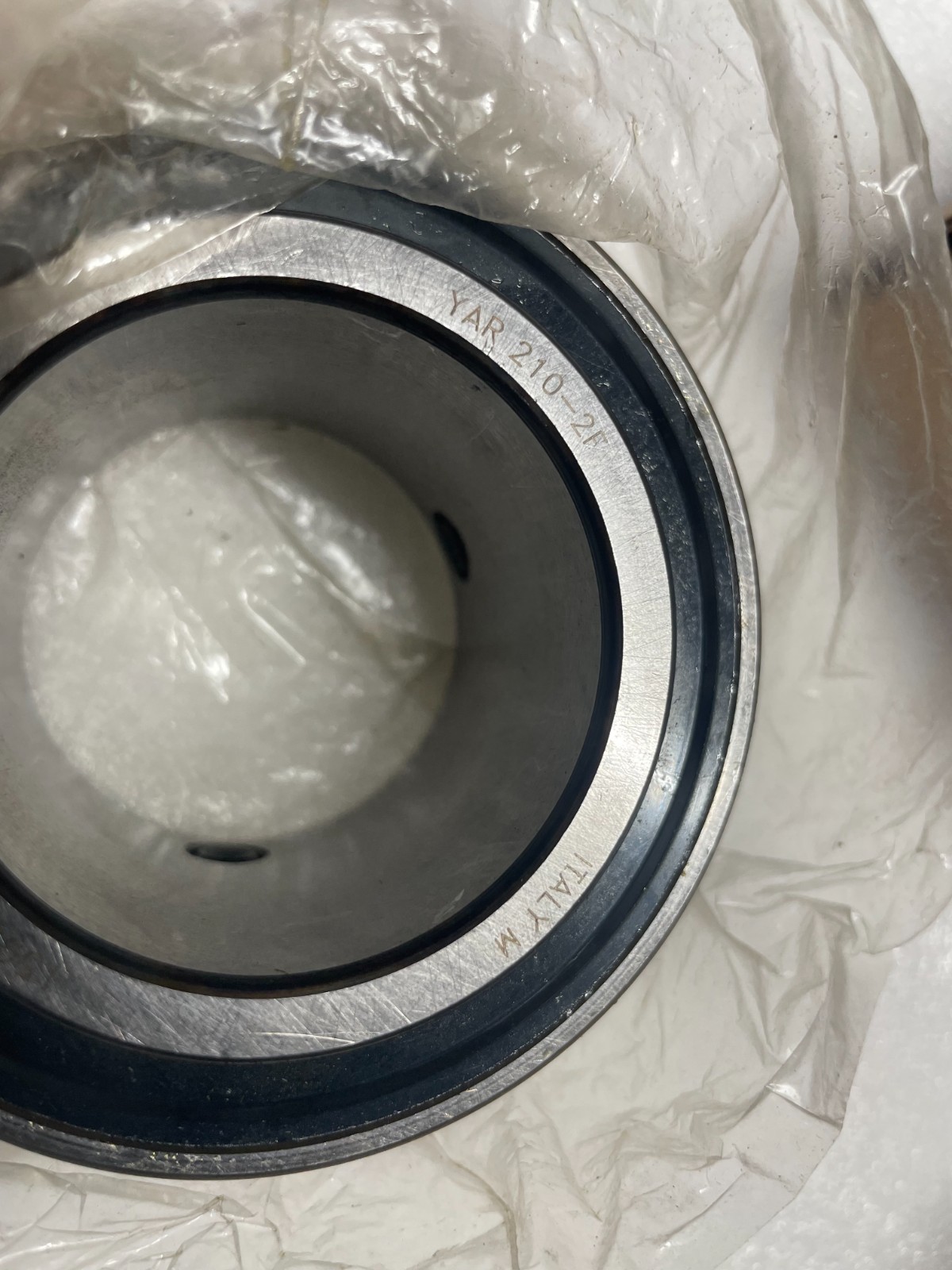 Two SKF YAR210-2F Insert bearings