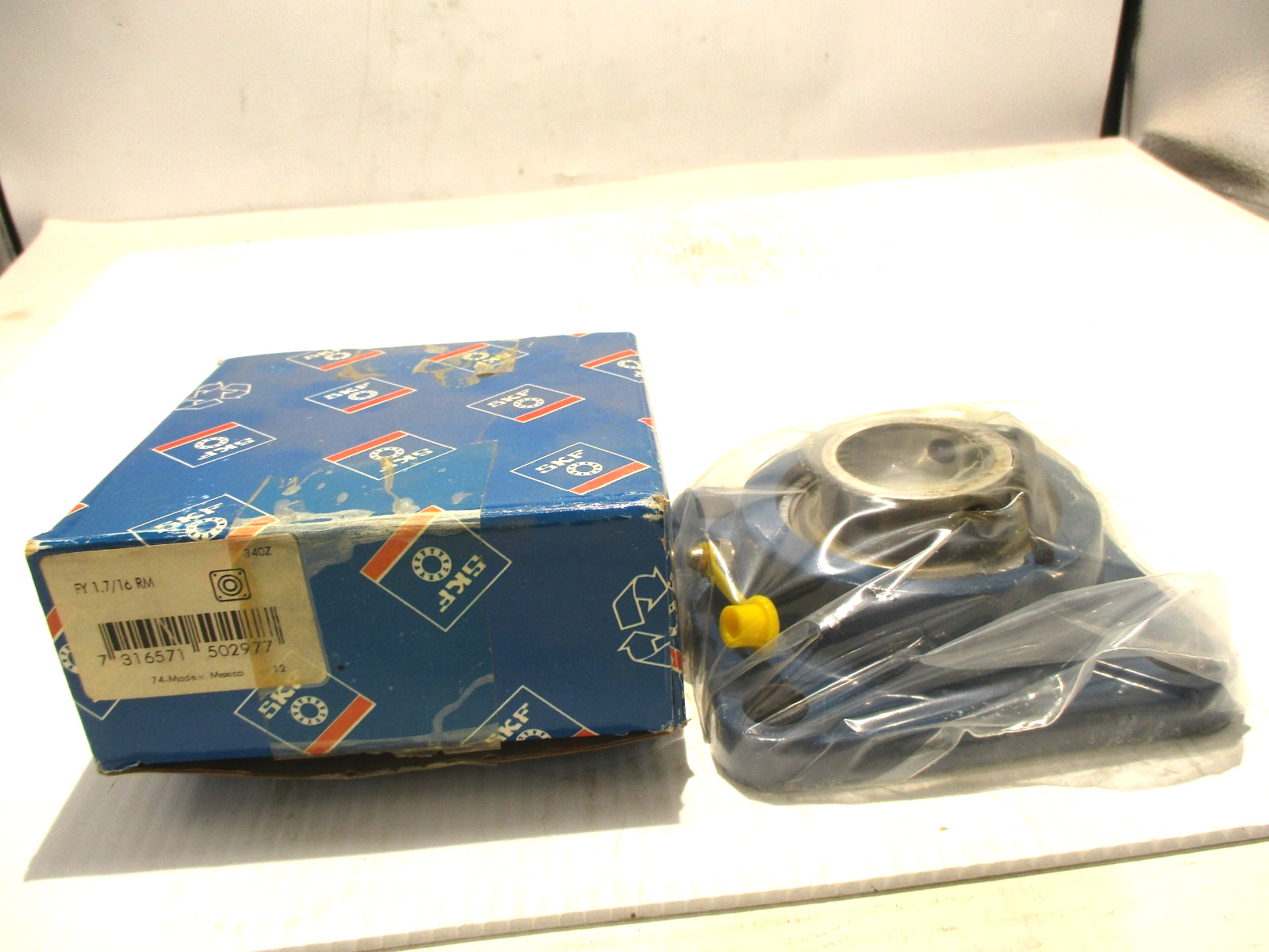 NEW SKF FY 1-7/16 RM 4-BOLT FLANGE BEARING