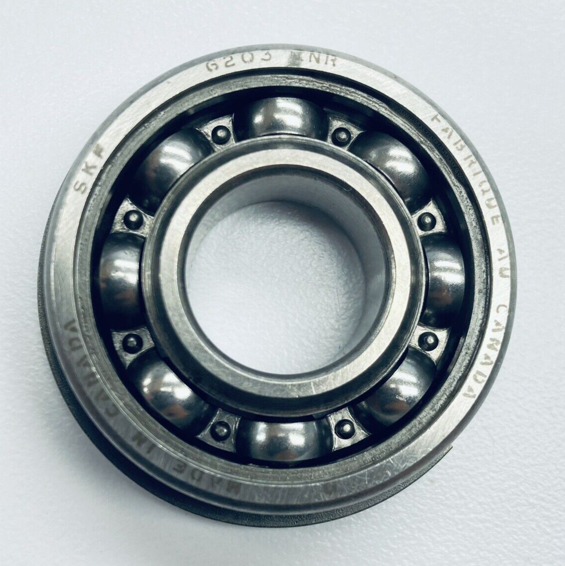 UNUSED SKF 6203 NR DEEP GROOVE BALL BEARING 17mmID 40mmOD 12mmW