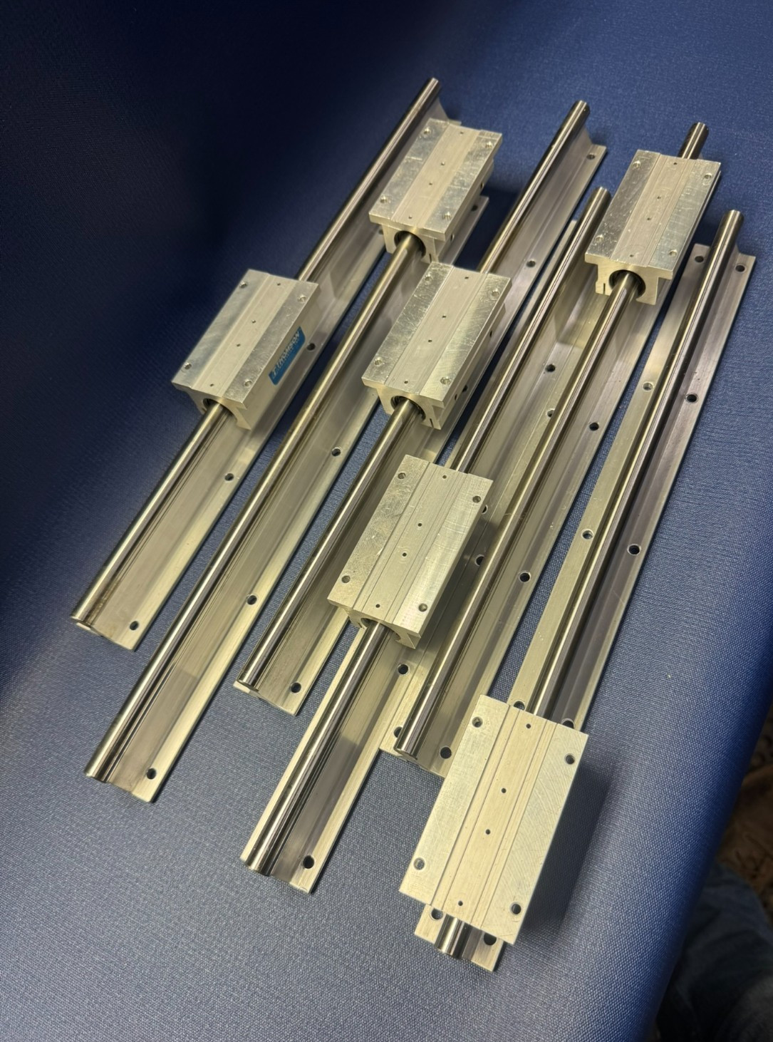 Lot of 6 – Thomson TWN8-OPN Linear Bearings on 17″ Rails