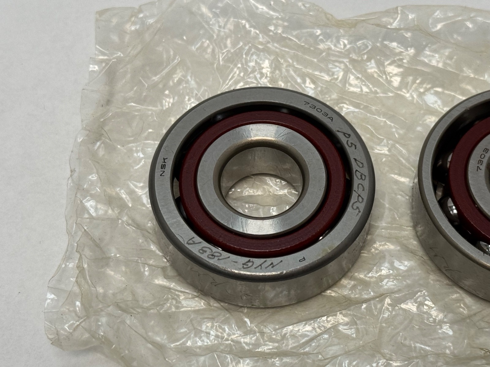 NSK 7303ATDBP5 Angular Bearing 7303E 7303SCD 7303A5 7303-A-T-DB-P5 17x47x14 mm