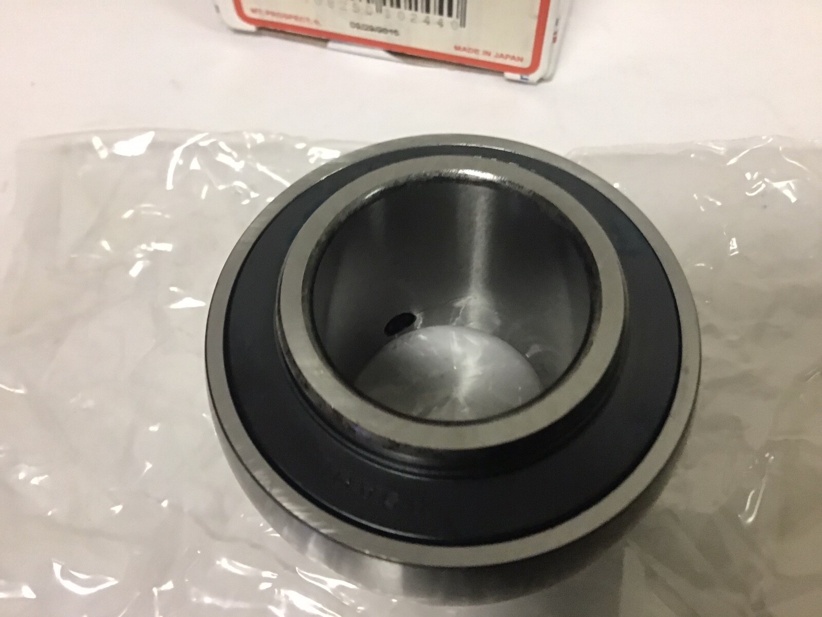 New AMI UC206-20 Insert Bearing, 1.2500″ ID, 2.4409 OD, With Set Screw
